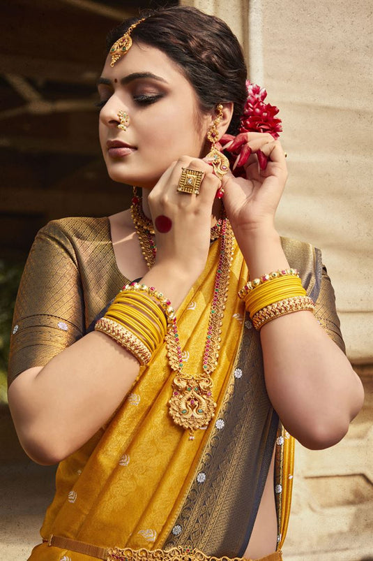 Gorgeous Mustard Color Kanjivaram Silk Saree with Weaving Work