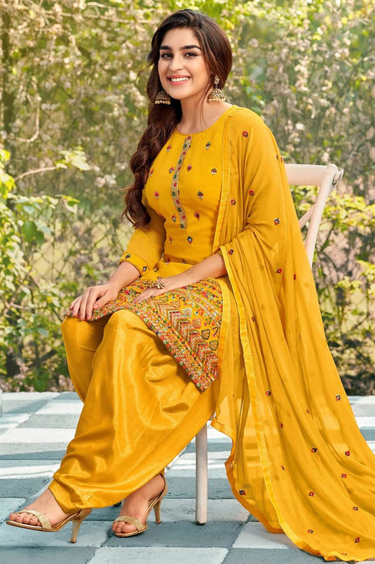 Sober Georgette Fabric Embroidered Yellow Color Patiala Suit