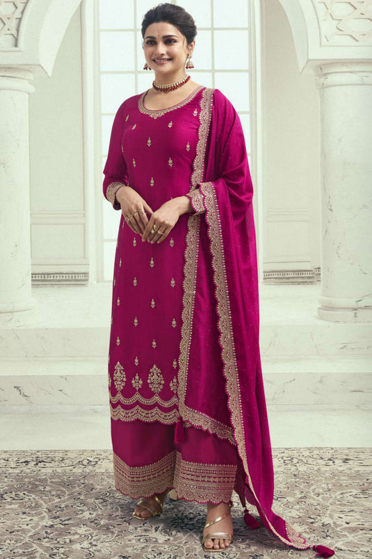 Prachi Desai Rani Color Georgette Silk Adorming Embroidered Palazzo Suit