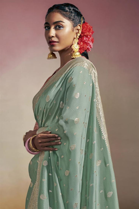 Sea Green Color Splendid Minakari Pallu Saree In Viscose Fabric