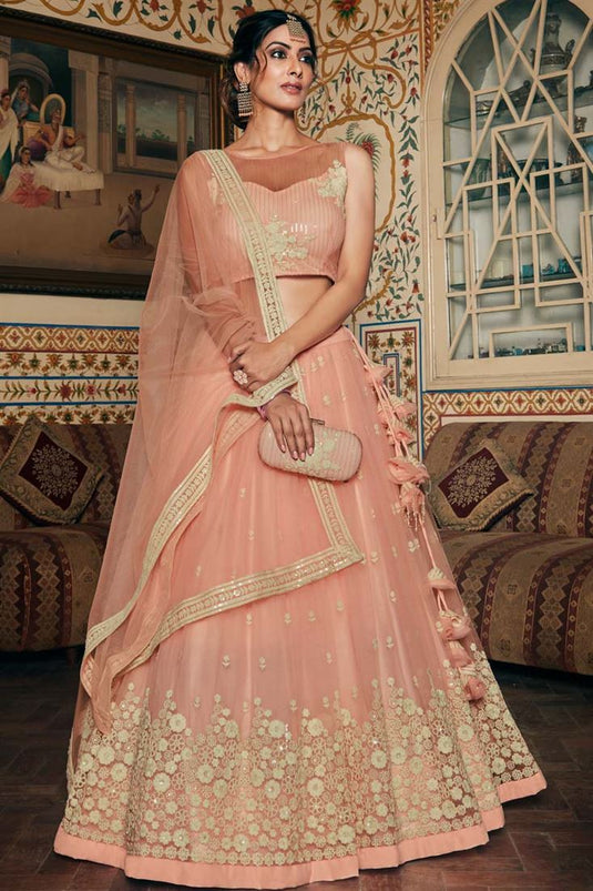 Peach Color Net Fabric Aloof Sangeet Wear Embroidered Work Lehenga