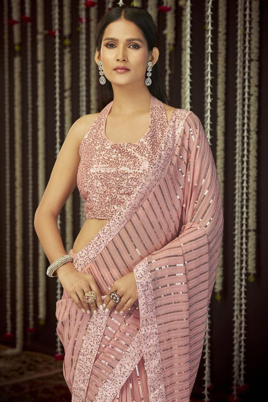 Party Style Georgette Fabric Superior Border Work Saree In Pink Color