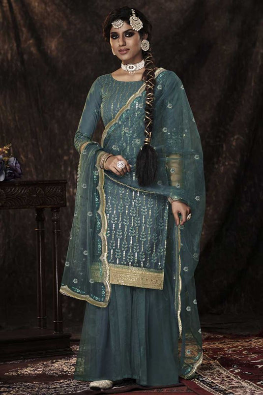 Exclusive Net Fabric Cyan Color Function Wear Riveting Sharara Suit With Sequins Work
