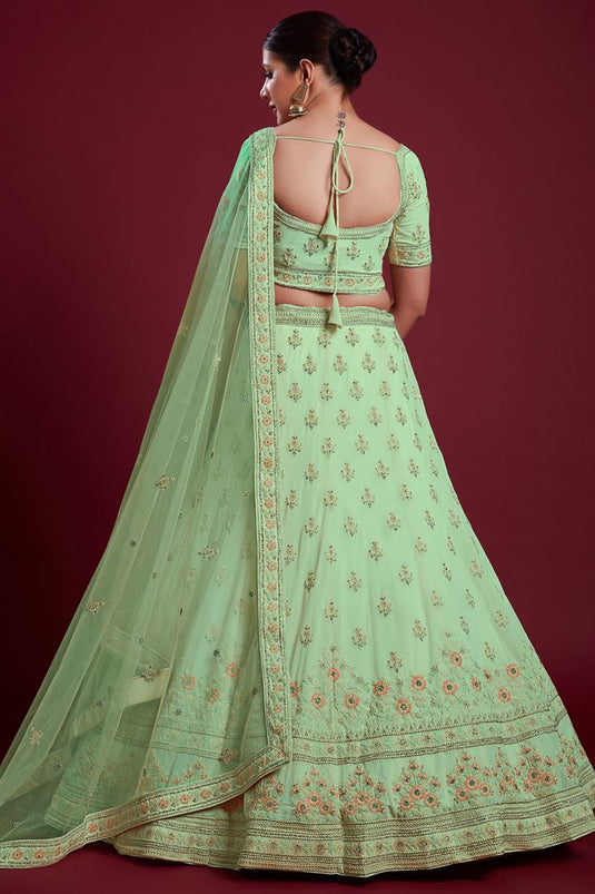 Radiant Sea Green Georgette Lehenga with Sparkling Zarkan Embellishments for Special Occasions