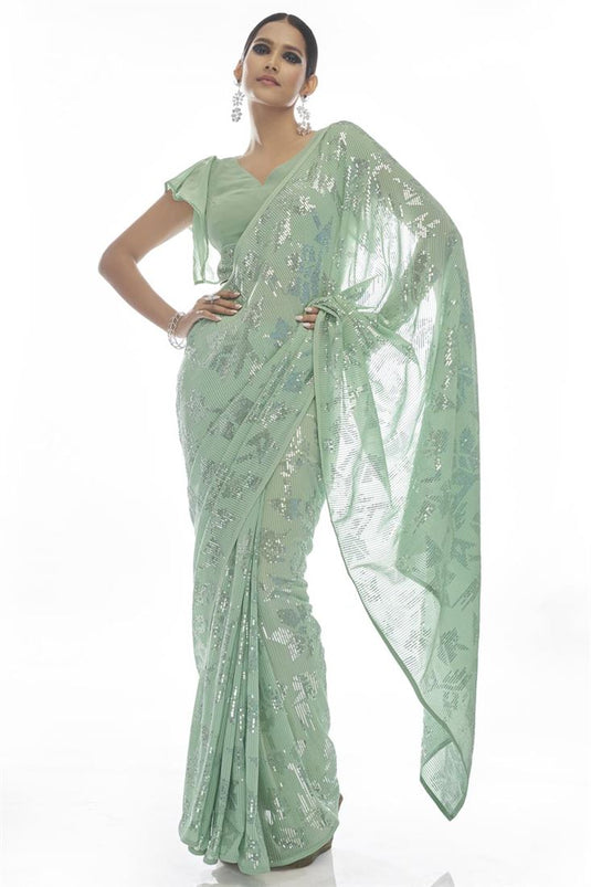 Party Look Sea Green Color Appealing Sequins Work Georgette Saree