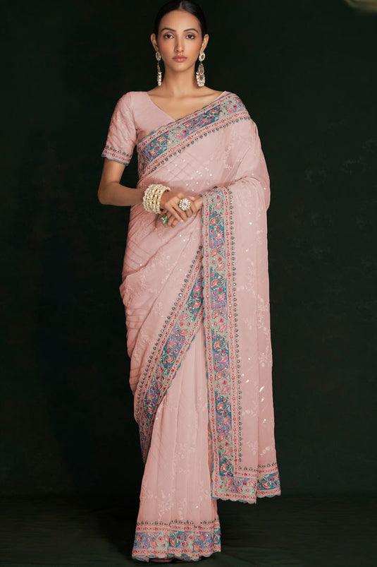 Stunning Peach Georgette Saree with Intricate Lucknowi Work