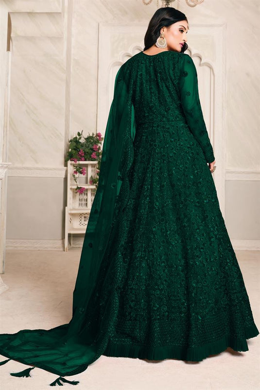 Net Fabric Embroidery Work Festive Wear Trendy Anarkali Suit In Dark Green Color