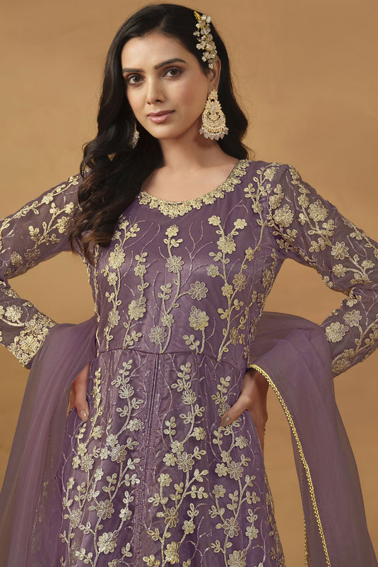 Net Fabric Function Wear Mesmeric Anarkali Suit In Lavender Color