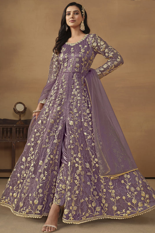 Net Fabric Function Wear Mesmeric Anarkali Suit In Lavender Color