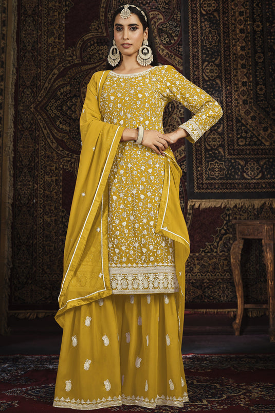 Fancy Embroidered Function Wear Palazzo Salwar Suit In Yellow Color