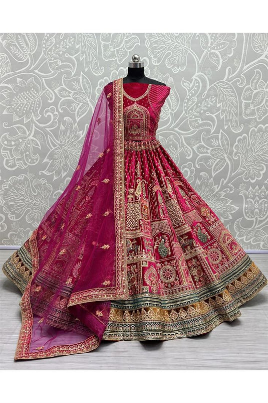 Pink Color Raw Silk Base Wedding Wear Lehenga With Net Dupatta