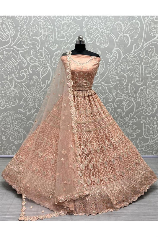 Net Fabric Peach Delicate Sequins Work Bridal Lehenga