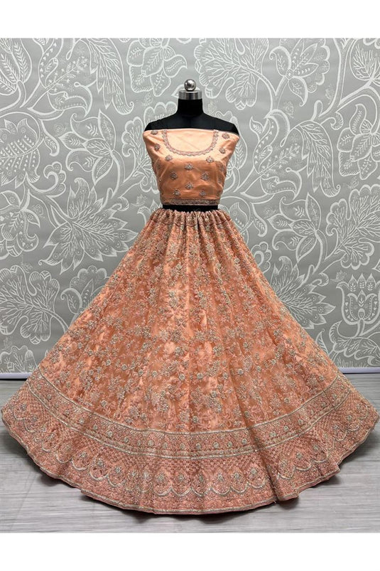 Creative Sequins Work Net Fabric Lehenga In Peach Color