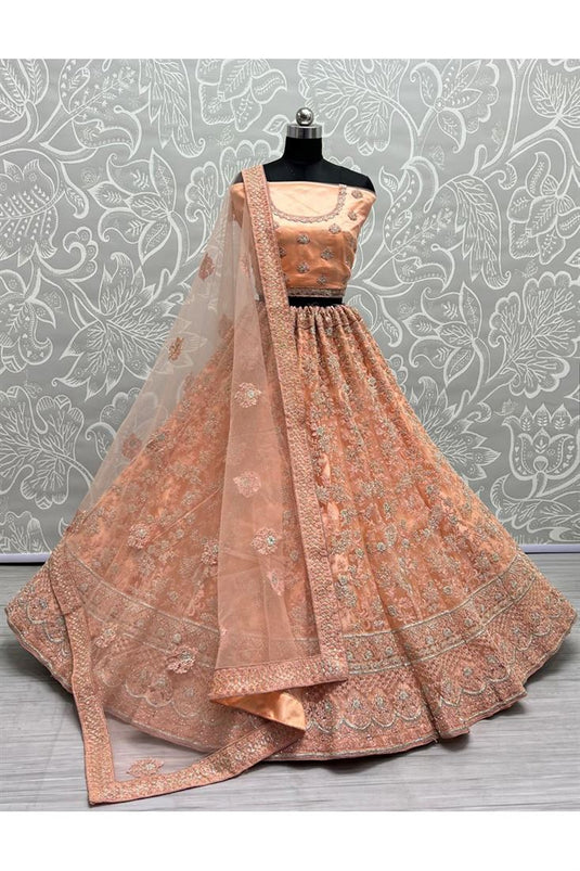 Creative Sequins Work Net Fabric Lehenga In Peach Color