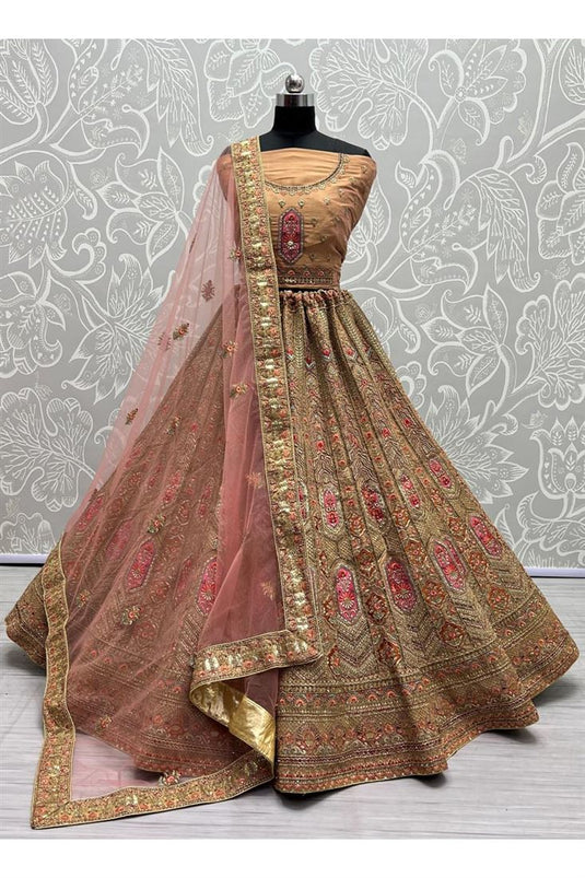 Net Fabric Delicate Embroidered Wedding Bridal Lehenga in Peach Color