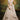 Tempting Net Fabric Cream Color Wedding Wear Lehenga Choli With Embroidered Work
